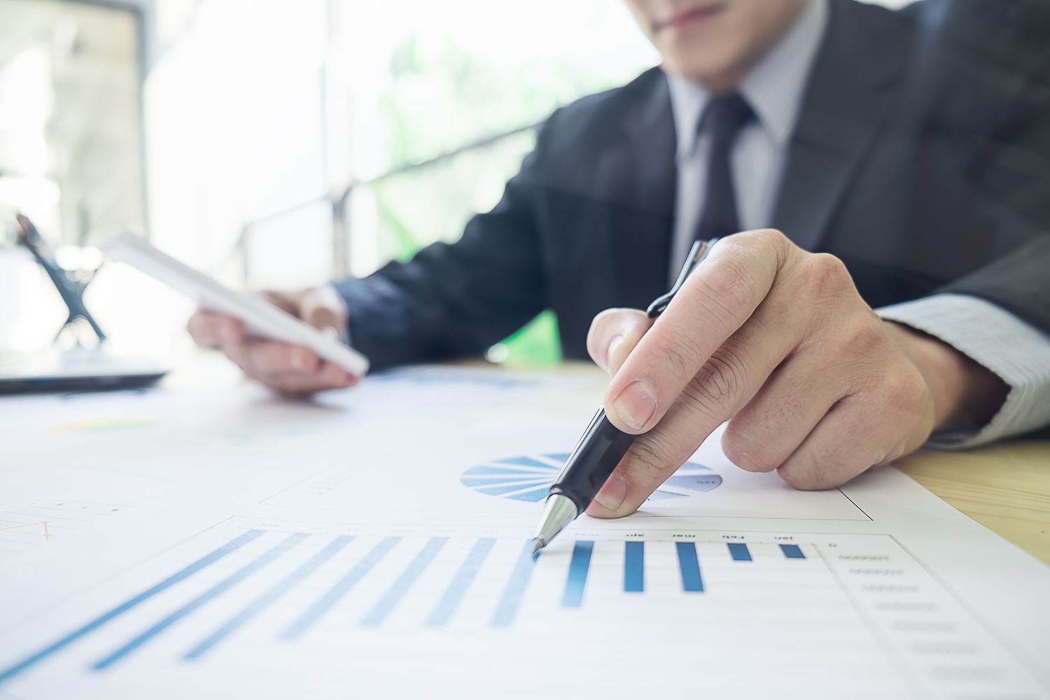 attorney writing on a graph